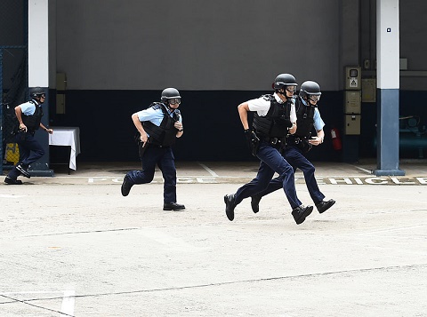 Photograph: Police officers of Emergency Unit participating in a drill