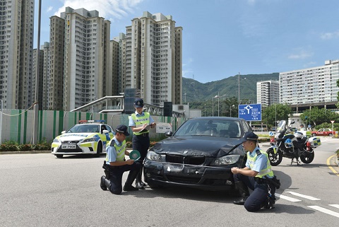 Photograph: Traffic Police officers investigating a non-fatal traffic accident
