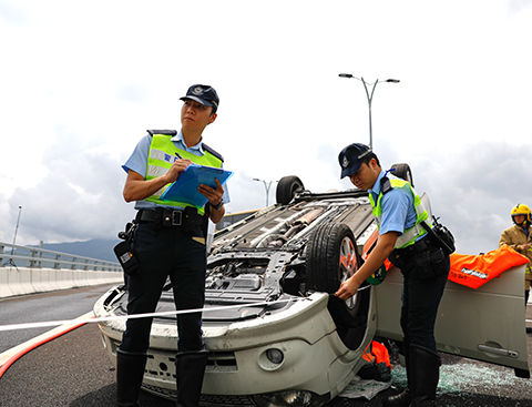 Photograph: Police officers of Emergency Unit on duty