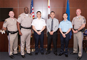 Officers from Traffic Branch Headquarters attend the 18th International Association of Chiefs of Police Annual Conference on Drug, Alcohol and Impaired Driving in Seattle. After the meeting, they visit the California Highway Patrol to learn more about the training on drug recognition.