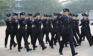 The Police College graduates are on the march at apassing-out parade.