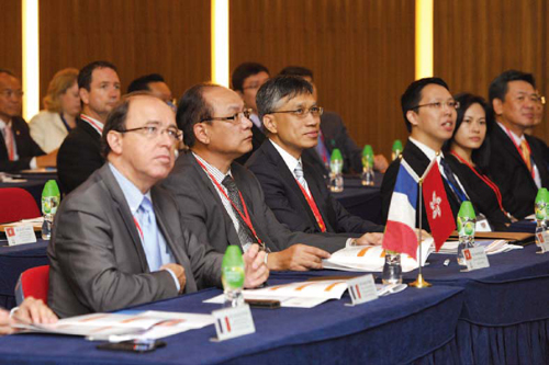 The Director of International Cooperation Department of the French National
Police, Mr Emile Perez (left), attends an international commercial crime conference
held at Police Headquarters.