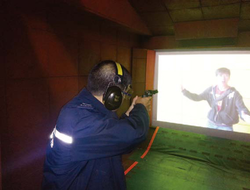 Mini-Range System is a use-of-force decision making training system, featuring scenario-based interactive videos for training Police officers using conventional firearms, laser simulated weapons, Oleoresin Capsicum foam, batons and torches under controlled environments and intense pressure, for instance, in a total darkness environment.