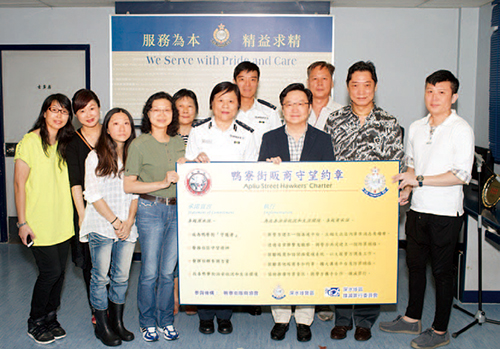 Under the “Apliu Street Hawkers' Charter”, hawkers help Police fight crime by providing crime information.
