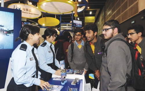 Education and Careers Expo visitors learn about
policing duties at the Force booth.