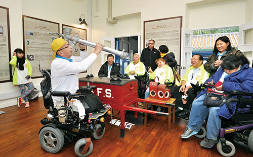 Visitors viewing exhibits at an open day held at the Peak Police Station.