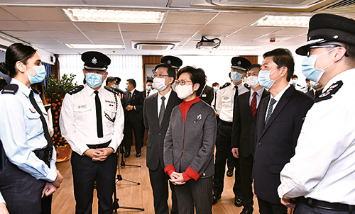 HKSAR Chief Executive and Director of Liaison Office of Central People's
Government visit police officers