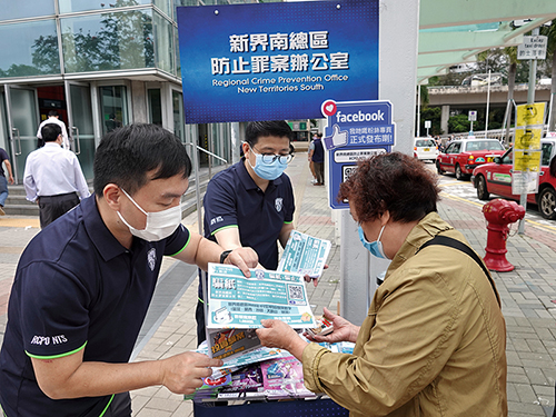 The Scam Brief • End Scams bulletin is given out at public transport interchanges.