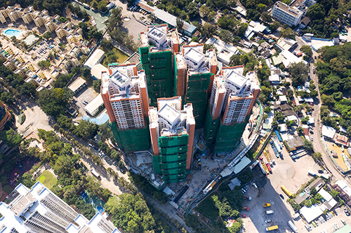 Photovoltaic panels are installed on top of the Police Officers' Club and two residential blocks at the Fan Garden to generate electricity.