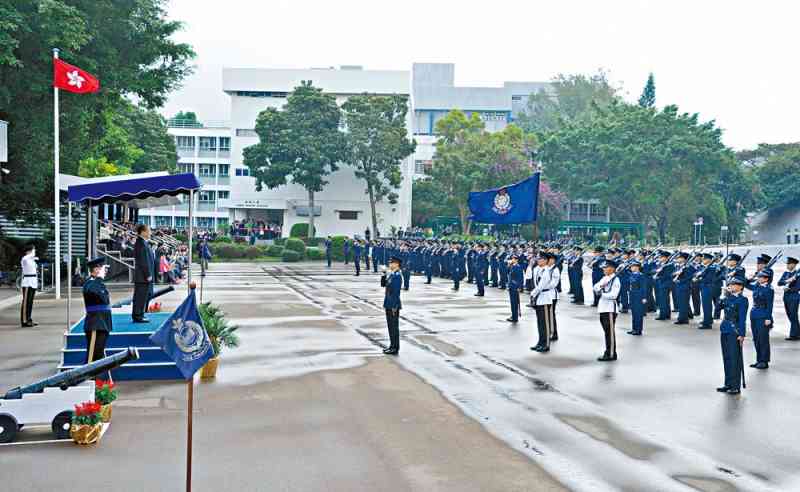 Mr Ho attends the passing-out parade at Police College