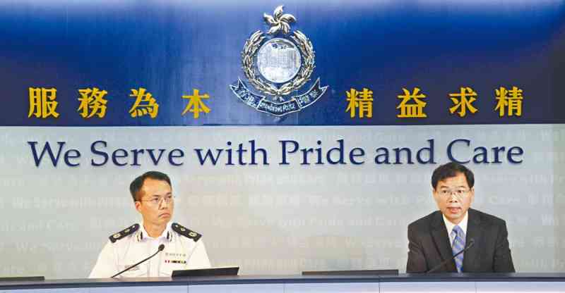 Both Mr Au (right) and Mr Lau answer media questions at the press conference