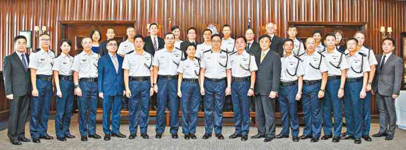 Mr Lo Wai-chung presents promotion letters to 29 officers