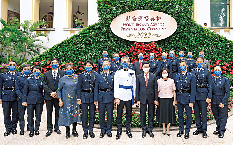 The Chief Executive Mr John Lee and Commissioner Siu Chak-yee congratulate the Force awardees of the Hong Kong Police Medal for Meritorious Service.