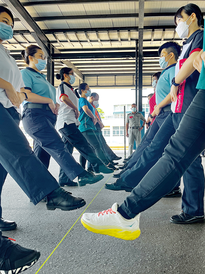 Instructors of youth uniformed groups receive Chinese Drill training.